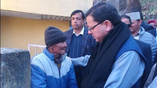 Uttarakhand chief minister Pushkar Singh Dhami visited the affected areas of Joshimath town in Chamoli district and met the people (HT Photo)