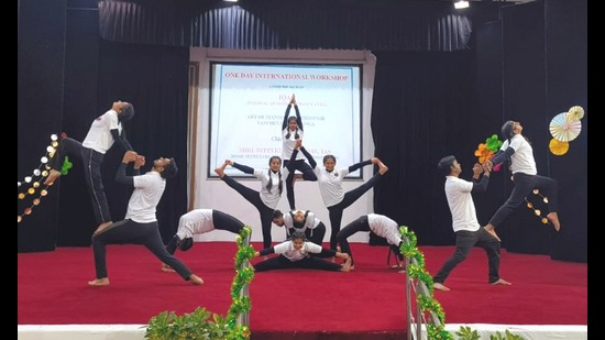 During the event, students demonstrated different yoga asanas. (HT Photo)