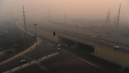 A view of morning traffic amid heavy smog in New Delhi. (AFP)