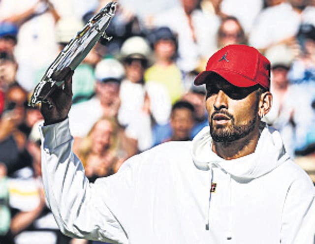 Nick Kyrgios of Australia wears a red cap on court during the trophy presentation at Wimbledon. “I do what I want,” he later said. (Getty Images) Nick Kyrgios of Australia wears a red cap on court during the trophy presentation at Wimbledon. “I do what I want,” he later said. (Getty Images)