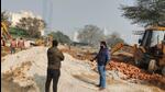 Gurugram, India-January 08, 2023: A team from MCG demolished the illegal construction in Badshahpur village near Jharsa Bandh, in Gurugram, India, on Sunday, 08 January 2023. (Photo by Parveen Kumar/Hindustan Times) Gurugram, India-January 08, 2023: A team from MCG demolished the illegal construction in Badshahpur village near Jharsa Bandh, in Gurugram, India, on Sunday, 08 January 2023. (Photo by Parveen Kumar/Hindustan Times)