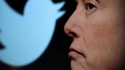 Twitter logo and a photo of Elon Musk are displayed through magnifier in this illustration. (Reuters) Twitter logo and a photo of Elon Musk are displayed through magnifier in this illustration. (Reuters)