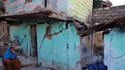 A resident sits next to a cracked wall of her house at Joshimath in Chamoli district of India's Uttarakhand. (AFP) A resident sits next to a cracked wall of her house at Joshimath in Chamoli district of India's Uttarakhand. (AFP)