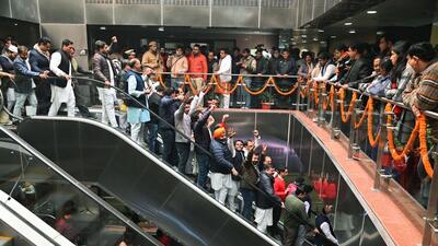 Bharatiya Janata Party (BJP) and Aam Aadmi Party (AAP) councillors raise slogans as they leave after the MCD House was adjourned at the Civic Centre in New Delhi on Friday. (ANI) Bharatiya Janata Party (BJP) and Aam Aadmi Party (AAP) councillors raise slogans as they leave after the MCD House was adjourned at the Civic Centre in New Delhi on Friday. (ANI)