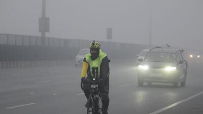 Gurugram, India-January 08, 2023: A group of cyclists rides bicycles at National Highway-48 amid cold and dense foggy morning near Signature Tower flyover, in Gurugram, India, on Sunday, 08 January 2023. (Photo by Parveen Kumar/Hindustan Times) Gurugram, India-January 08, 2023: A group of cyclists rides bicycles at National Highway-48 amid cold and dense foggy morning near Signature Tower flyover, in Gurugram, India, on Sunday, 08 January 2023. (Photo by Parveen Kumar/Hindustan Times)