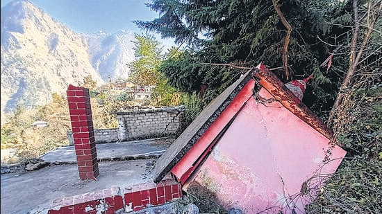 A temple collapses after the gradual 'sinking' of Joshimath in Chamoli district, on Sunday. (PTI)