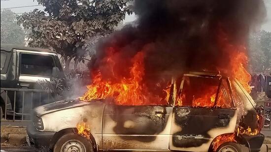 The Maruti Suzuki 800 car after catching fire near Chandigarh road, Ludhiana. (HT Photo)