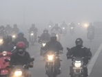 Vehicles ply on a road amid dense fog on a cold winter day, in New Delhi.(Amit Sharma) Vehicles ply on a road amid dense fog on a cold winter day, in New Delhi.(Amit Sharma)