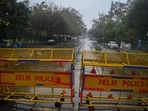 TOPSHOT - A Delhi police barrier blocks a street. (AFP) TOPSHOT - A Delhi police barrier blocks a street. (AFP)