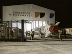 This undated photo provided by Virgin Orbit on Monday, January 9, 2023, shows the LauncherOne rocket in a hanger at Spaceport Cornwall, at Cornwall Airport in Newquay, England. (Virgin Orbit via AP) This undated photo provided by Virgin Orbit on Monday, January 9, 2023, shows the LauncherOne rocket in a hanger at Spaceport Cornwall, at Cornwall Airport in Newquay, England. (Virgin Orbit via AP)