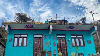 A red cross is marked on an unsafe building by the government due to the gradual “sinking” of Joshimath in Chamoli district. (PTI PHOTO) A red cross is marked on an unsafe building by the government due to the gradual “sinking” of Joshimath in Chamoli district. (PTI PHOTO)