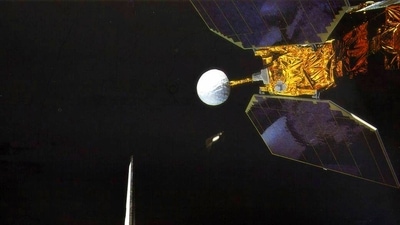 The space shuttle Challenger launches the Earth Radiation Budget Satellite in 1984. (NASA via AP)