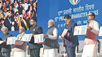 Indore, Jan 09 (ANI): Prime Minister Narendra Modi with Guyana President Dr Mohamed Irfaan Ali, Suriname President Chandrikapersad Santokhi and others releases a Commemorative Postal Stamp on ‘Surakshit Jayen, Prashikshit Jayen’ at the 17th Pravasi Bharatiya Divas, in Indore on Monday. (ANI/PIB) Indore, Jan 09 (ANI): Prime Minister Narendra Modi with Guyana President Dr Mohamed Irfaan Ali, Suriname President Chandrikapersad Santokhi and others releases a Commemorative Postal Stamp on ‘Surakshit Jayen, Prashikshit Jayen’ at the 17th Pravasi Bharatiya Divas, in Indore on Monday. (ANI/PIB)