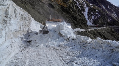 Snow being cleared from the Srinagar-Leh National highway. (PTI Photo) Snow being cleared from the Srinagar-Leh National highway. (PTI Photo)