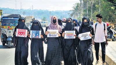 PUCL report said the hijab ban violated various constitutional and fundamental rights of the Muslim student. (PTI) PUCL report said the hijab ban violated various constitutional and fundamental rights of the Muslim student. (PTI)