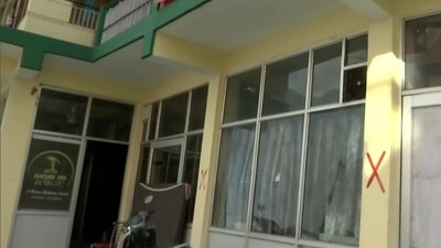 Joshimath: Red cross drawn outside a building to mark it as unsafe. (ANI) Joshimath: Red cross drawn outside a building to mark it as unsafe. (ANI)