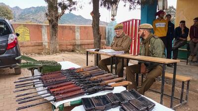 Rifles being distributed to village defence committees in J&K’s Rajouri district. (PTI)