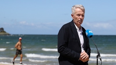 Craig Tiley, CEO of Tennis Australia talks to the media during a photo shoot at Brighton Beach (REUTERS)