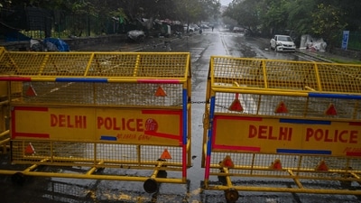 TOPSHOT - A Delhi police barrier blocks a street.  (AFP)