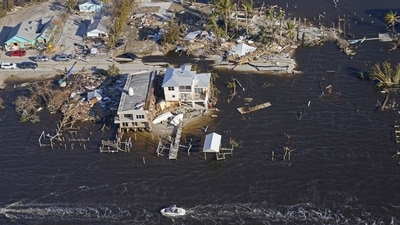 The bridge leading from Fort Myers to Pine Island, Fla., is seen heavily damaged in the aftermath of Hurricane Ian on Pine Island, Fla., Oct. 1, 2022. (AP Photo/Gerald Herbert, File) The bridge leading from Fort Myers to Pine Island, Fla., is seen heavily damaged in the aftermath of Hurricane Ian on Pine Island, Fla., Oct. 1, 2022. (AP Photo/Gerald Herbert, File)