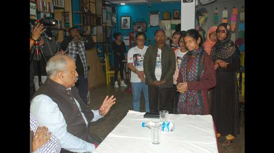 ADG, Agra zone, Rajeev Krishna interacting with acid attack survivors at Sheroes Hangout in Agra. (HT file)
