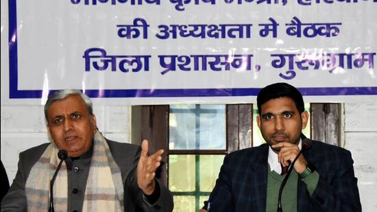 Gurugram, India-January 09, 2023: Jai Parkash Dalal, Agriculture minister, and Nishant Kumar Yadav, Deputy Commissioner and others hearing a complaint during the grievance committee meeting in John Hall at Civil line, in Gurugram, India, on Monday, 09 January 2023. (Photo HT)