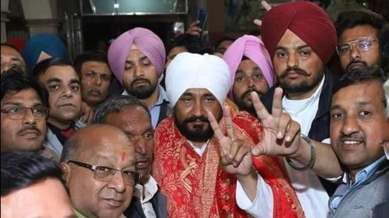 Then Punjab chief minister Charanjit Singh Channi (centre) campaigning for Mansa Congress candidate and Punjabi singer Shubhdeep Singh, Sidhu Moosewala (in maroon turban) on February 18, 2022, in the run-up to the assembly elections. (HT file photo)