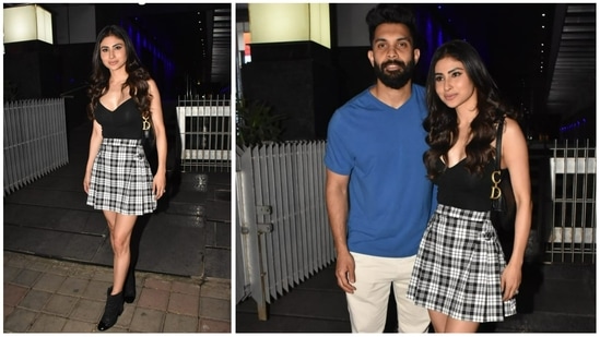 Mouni Roy and husband Suraj Nambiar were spotted visiting a restaurant in Mumbai on Sunday. Mouni is currently riding high on the success of last year's blockbuster Brahmastra. She played the antagonist in the film. (Varinder Chawla)