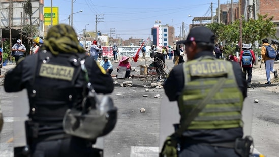 Protests resumed last week after a holiday lull. (Photo by Diego Ramos/AFP)