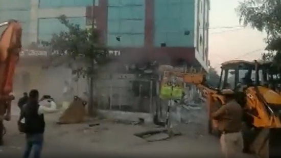 According to the authorities, the building was built illegally and officials reached the site with JCBs to tear it down in the presence of police.(ANI)