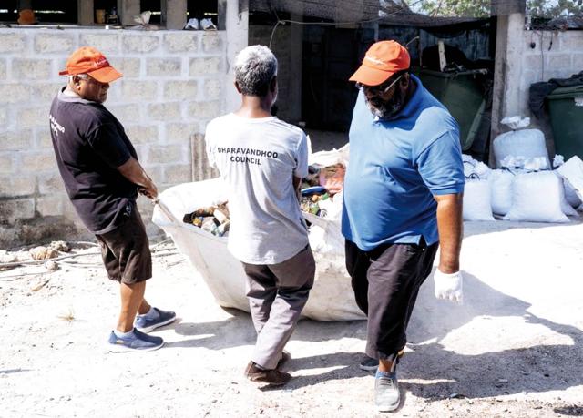 A waste segregation session at the Dharavandhoo waste management centre