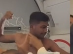 The shirtless man fighting with another passenger on flight.(source:Twitter/@Bitanko_Biswas) The shirtless man fighting with another passenger on flight.(source:Twitter/@Bitanko_Biswas)