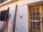 Cracks appear on a building in Joshimath area of Chamoli district, Tuesday, Jan. 10, 2023. (PTI)(PTI) Cracks appear on a building in Joshimath area of Chamoli district, Tuesday, Jan. 10, 2023. (PTI)(PTI)