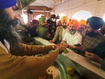 In this picture, Rahul Gandhi can be seen collecting 'prasad' at the Golden temple in Amritsar.(PTI)