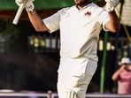 Mumbai's batter Prithvi Shaw celebrates after scoring a double-century Mumbai's batter Prithvi Shaw celebrates after scoring a double-century
