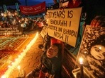 Children born with congenital disabilities, believed to have been caused by the exposure of their parents to gas leakage in the 1984 Bhopal gas tragedy, along with supporters take part in a candlelight vigil to pay homage to those killed in the disaster, in Bhopal.(PTI) Children born with congenital disabilities, believed to have been caused by the exposure of their parents to gas leakage in the 1984 Bhopal gas tragedy, along with supporters take part in a candlelight vigil to pay homage to those killed in the disaster, in Bhopal.(PTI)