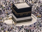 Saudi Arabia Hajj: Muslim pilgrims walk around the Kaaba, the cubic building at the Grand Mosque,. Saudi Arabia Hajj: Muslim pilgrims walk around the Kaaba, the cubic building at the Grand Mosque,.