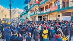 Local residents protest the demolitions near an affected hotel in Joshimath on Tuesday. (PTI) Local residents protest the demolitions near an affected hotel in Joshimath on Tuesday. (PTI)