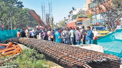 Congress attacks Bommai govt after two die in metro pillar collapse Congress attacks Bommai govt after two die in metro pillar collapse
