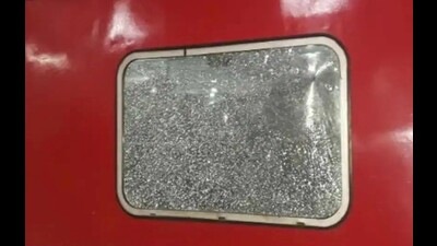 A window pane of a train damaged in a stone-pelting incident. (HT)