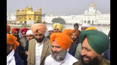 Congress leader Rahul Gandhi with Punjab unit leaders Amarinder Singh Raja Warring and Partap Singh Bajwa at the Golden Temple in Amritsar on Tuesday afternoon. (Sameer Sehgal/HT) Congress leader Rahul Gandhi with Punjab unit leaders Amarinder Singh Raja Warring and Partap Singh Bajwa at the Golden Temple in Amritsar on Tuesday afternoon. (Sameer Sehgal/HT)