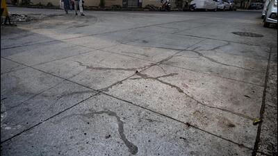 Following the HT report, the chief engineer for roads was instructed by the additional municipal commissioner (projects) P Velrasu to investigate the matter, and core samples were taken of the roads. On Tuesday, Velrasu said that all the panels that had developed cracks would be recast. “An equivalent amount will be levied on the contractor as penalty,” he said. (Satish Bate/HT PHOTO) Following the HT report, the chief engineer for roads was instructed by the additional municipal commissioner (projects) P Velrasu to investigate the matter, and core samples were taken of the roads. On Tuesday, Velrasu said that all the panels that had developed cracks would be recast. “An equivalent amount will be levied on the contractor as penalty,” he said. (Satish Bate/HT PHOTO)