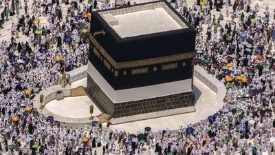 Saudi Arabia Hajj: Muslim pilgrims walk around the Kaaba, the cubic building at the Grand Mosque,. (AP) Saudi Arabia Hajj: Muslim pilgrims walk around the Kaaba, the cubic building at the Grand Mosque,. (AP)
