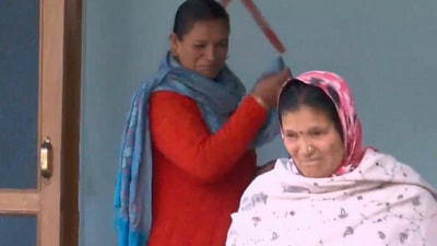 Uttarakhand: Local residents of 'sinking' town Joshimath tear up as they bid a painful goodbye to their houses located in 'unsafe zones'. (ANI)