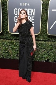 Debra Messing balanced the sequins with formal trousers. (Pinterest) Debra Messing balanced the sequins with formal trousers. (Pinterest)