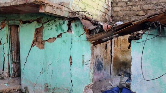 A house collapse in Joshimath. (PTI) A house collapse in Joshimath. (PTI)