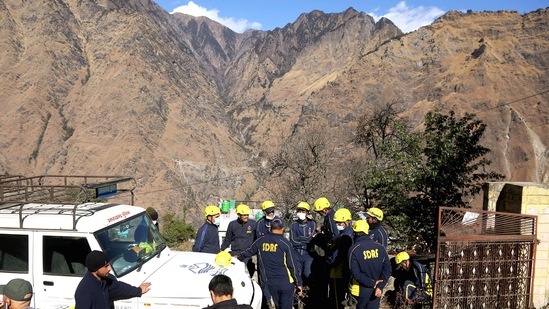 State Disaster Response Fund (SDRF) personnel arrive at the spot affected by the continuous land subsidence, in Joshimath on Tuesday. (ANI Photo/Ayush Sharma) State Disaster Response Fund (SDRF) personnel arrive at the spot affected by the continuous land subsidence, in Joshimath on Tuesday. (ANI Photo/Ayush Sharma)