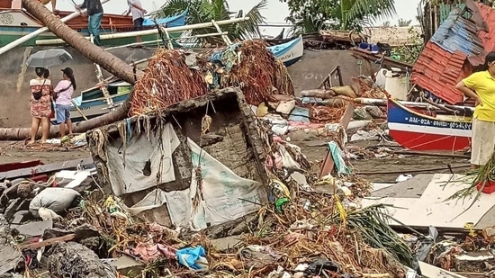 Philippine Storms: Residents surveying damage caused by heavy rain and floods in Oroquieta City, Misamis Occidental. (AFP)