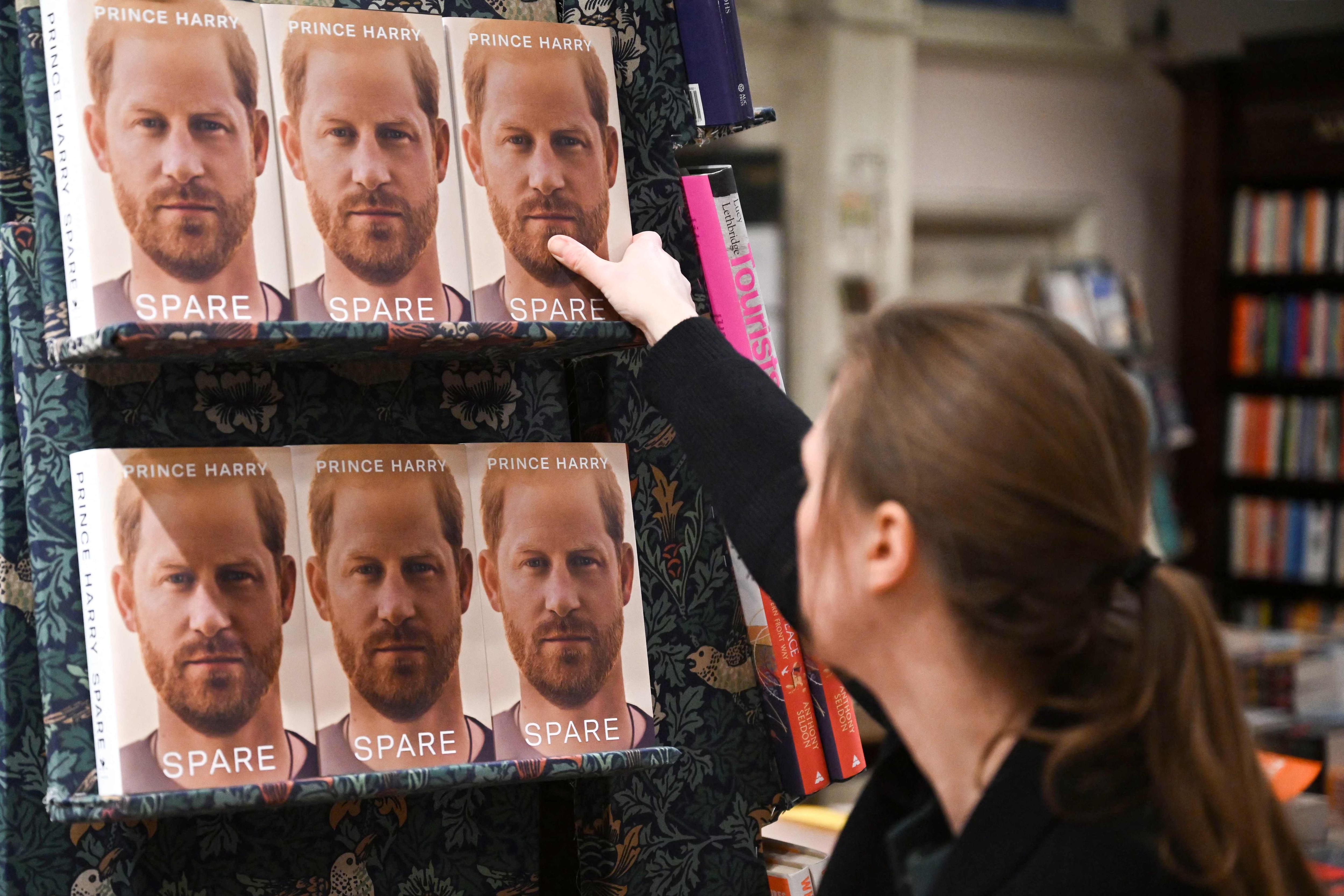 A bookseller displays copies of "Spare" by Britain's Prince Harry, Duke of Sussex. (AFP) A bookseller displays copies of "Spare" by Britain's Prince Harry, Duke of Sussex. (AFP)