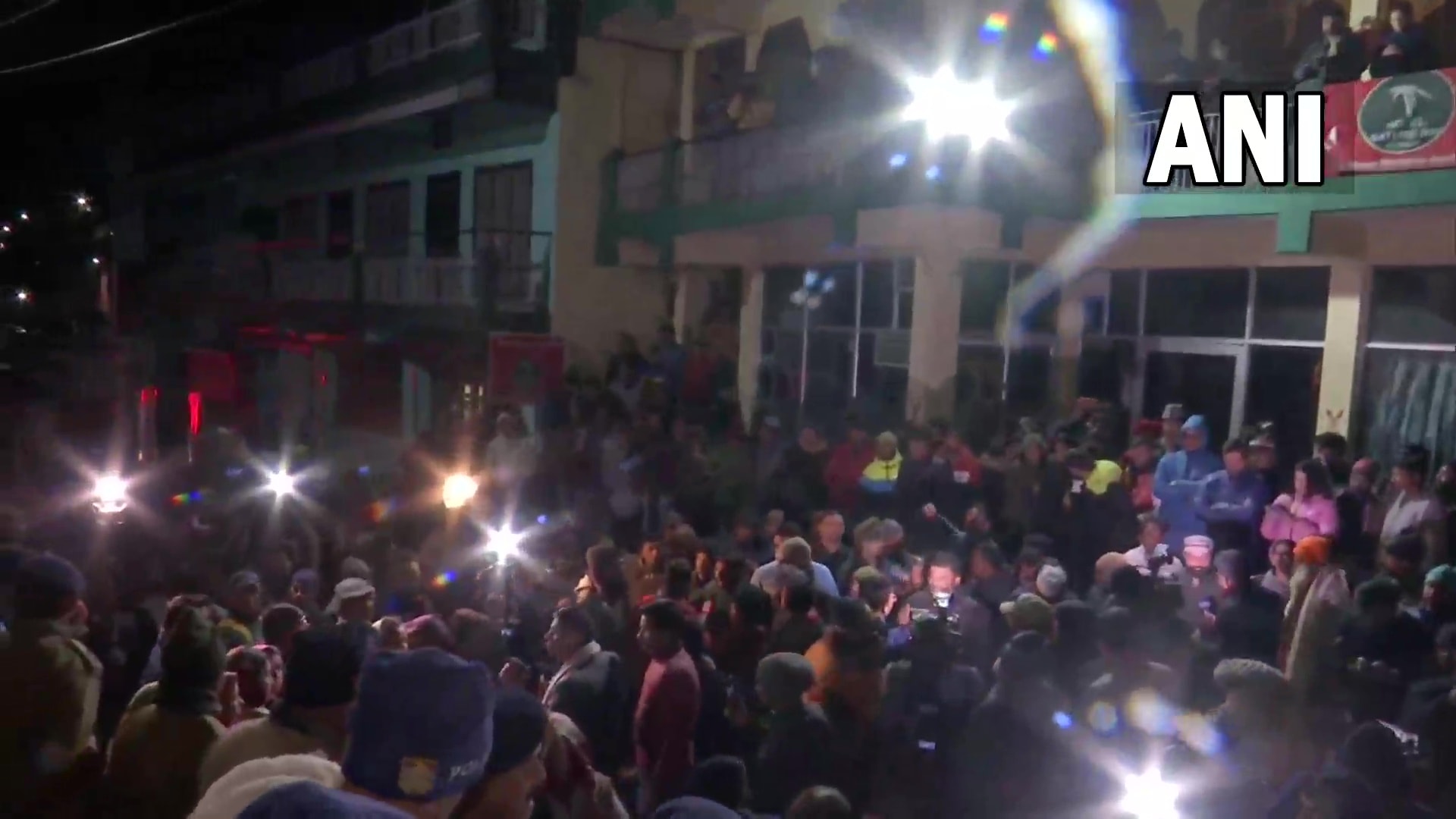 Protest outside Malari Inn in Joshimath, Uttarakhand